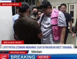 Lutfi Putra Lesmana Menangis Saat di Pakaikan jaket tahanan Oleh Kejati Sumut